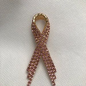 Pink ribbon breast cancer crystal brooch.